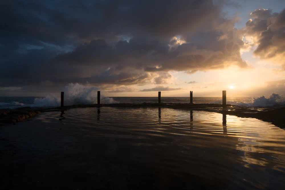 dramatic sunrise at rockpool